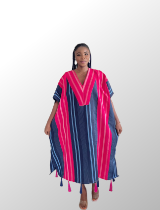 Woman wearing a pink and blue Aso Oke Bubu dress with intricate patterns”