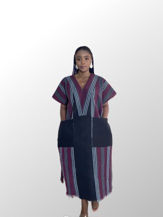 Model wearing a wine/burgundy aso oke bubu with pattern