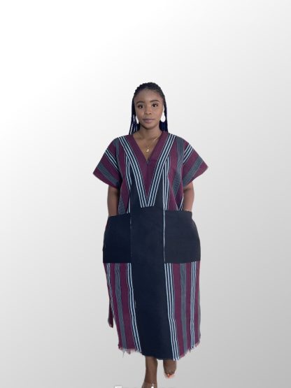 Model wearing a wine/burgundy aso oke bubu with pattern