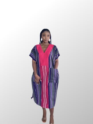 Woman wearing a Pink Aso Oke Bubu dress with intricate patterns”