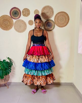 Multi-tier Ankara skirt made with vibrant African print fabric, featuring layered details for a stylish and elegant look.