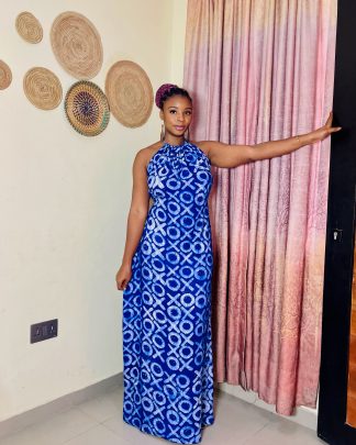 Elegant kabani backless dress, made with adire fabric, featuring an open- back design for a bold and stylish look